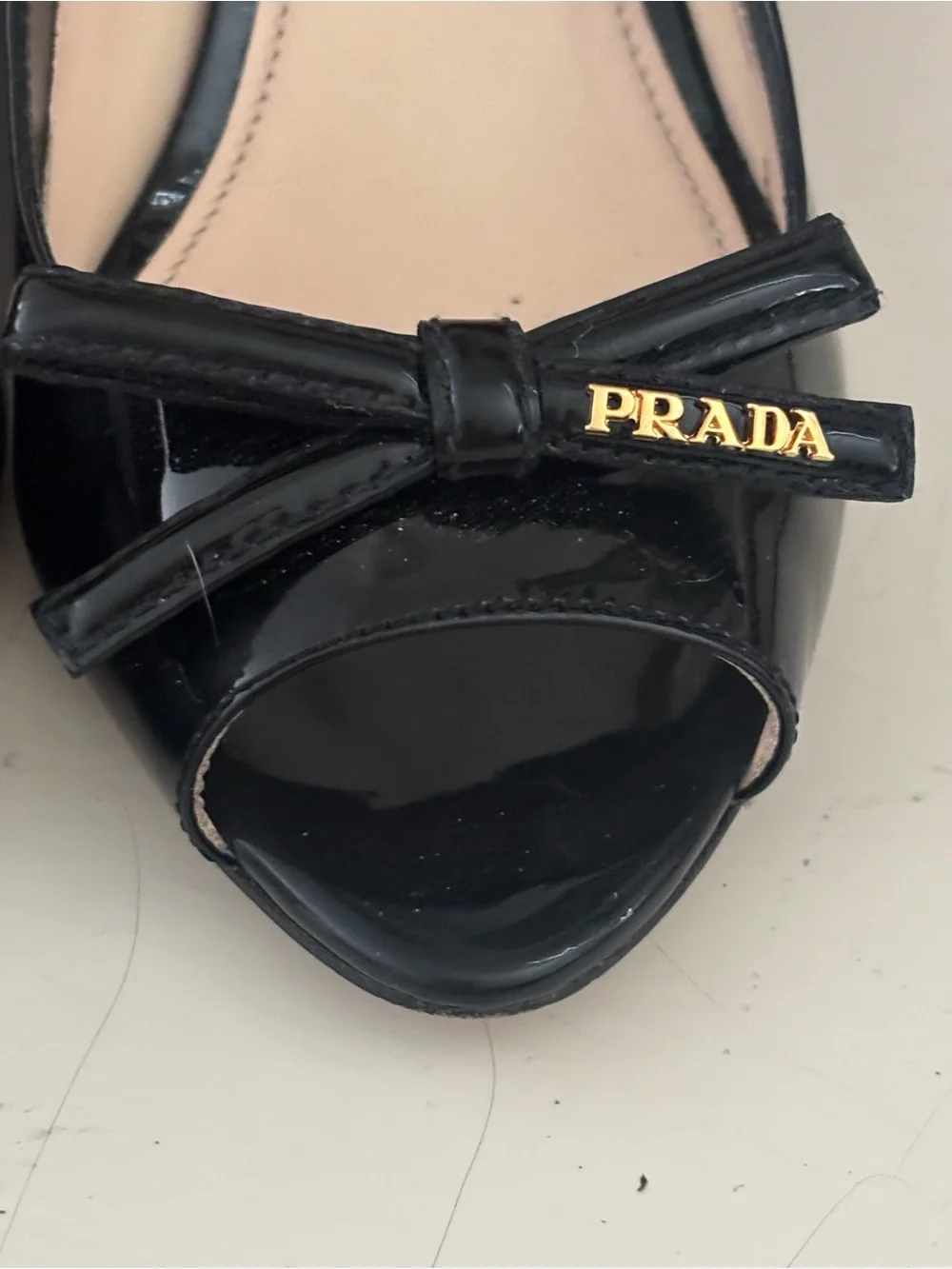 Prada Black Patent Leather Peep-Toe Wedges with Bow and Gold Accent